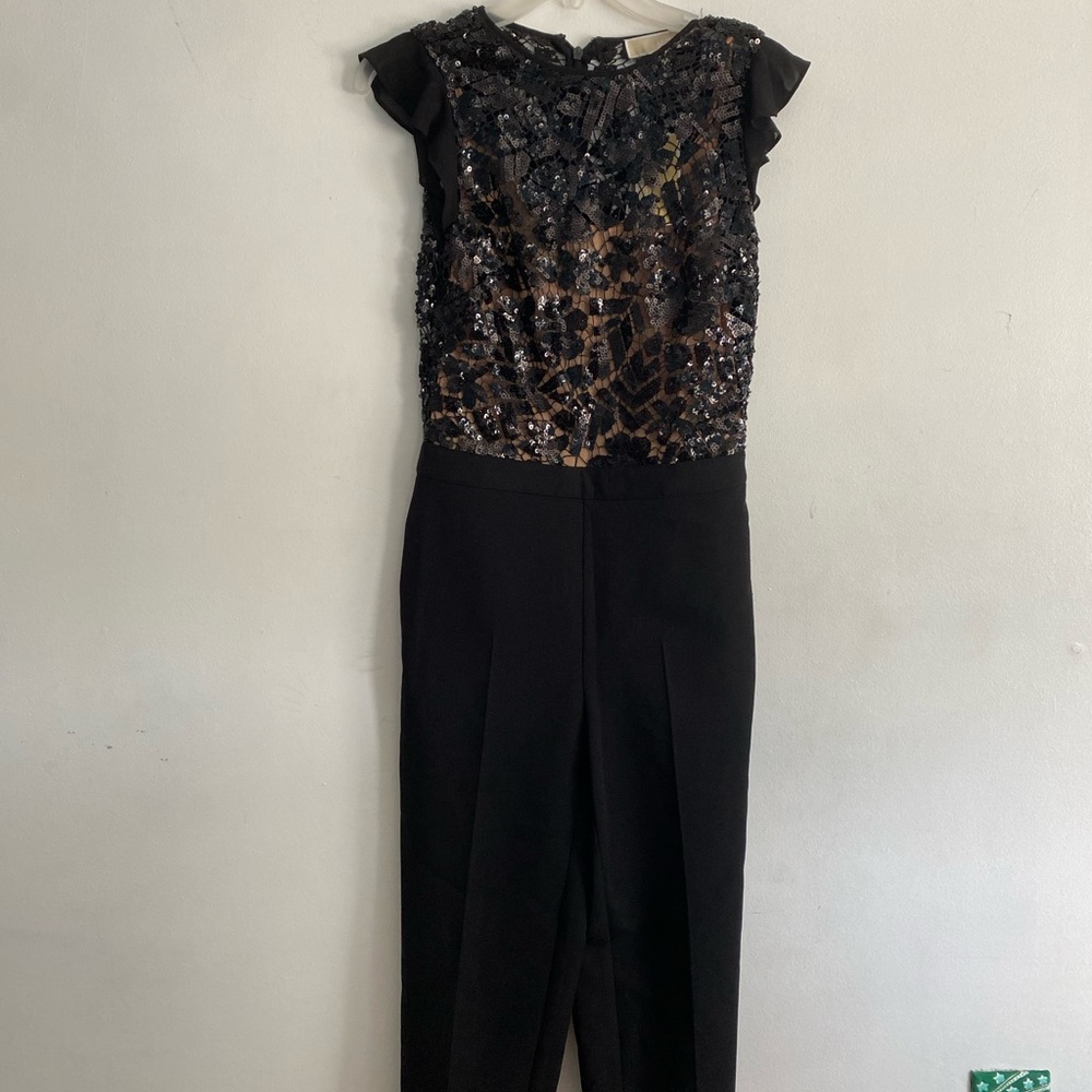 NEVER WORN MICHAEL KORS JUMPSUIT, size 00, black pant with sequined top